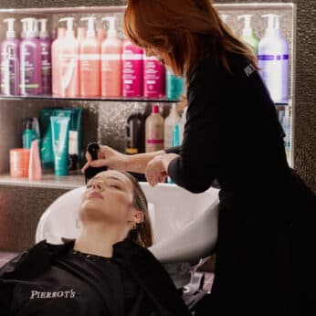 14 Guest receiving a nourishing hair treatment at Pierrot’s hair salon in Perth.